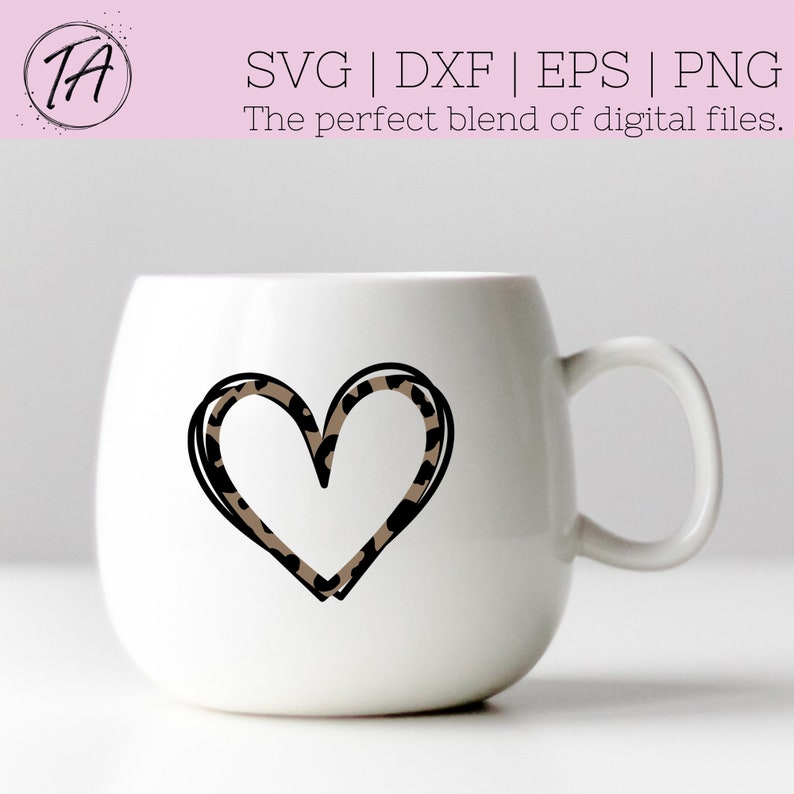 May include: White ceramic mug with a black outline of a heart filled with a leopard print pattern.
