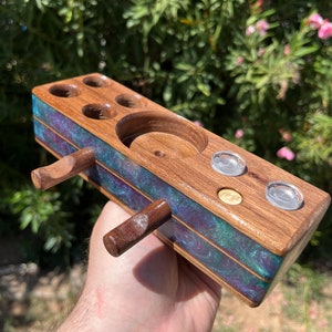 Dab station with tool pegs