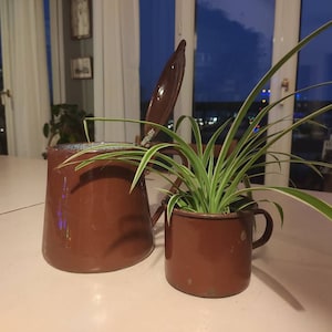 Set of enameled pot and coffee maker