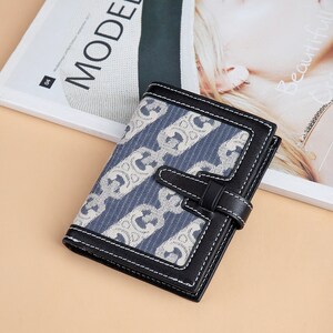Cartera con estampado de piel de vaca para mujer, diseño de nicho, plegable, estilo simple, billetera de celebridades de Internet, estilo corto