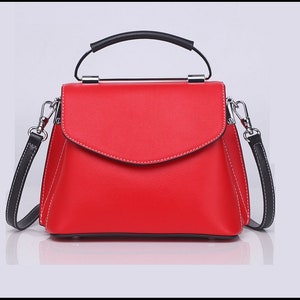 Nuevo estilo de cuero damas de estilo europeo y americano bolso de moda, fresco y dulce bolso cuadrado pequeño, color sólido de moda