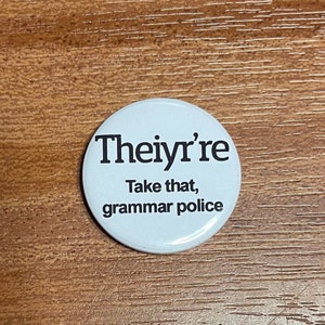 Theiyr’re 1 inch button badge