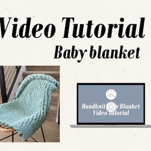 May include: A teal blue hand-knitted baby blanket on a chair with a laptop screen showing a video tutorial for hand-knitting a baby blanket.