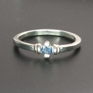 Montana sapphire ring.  Blue rock creek Montana sapphire.  3mm stone.  Solitaire band. Sterling silver.