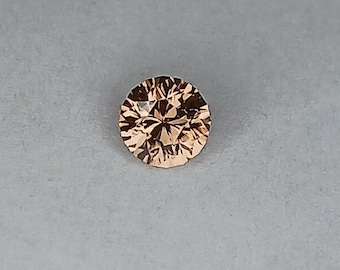 5mm zircon.  Nigerian brownish zircon.  Custom Cut in Colorado.  Faceted loose gemstone.  Gorgeous gemstone.  Top shelf gemstone.