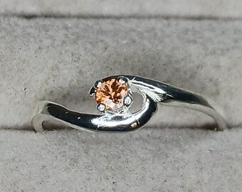 Zircon solitaire ring.  Sterling silver ring in size 7. Beautiful 3mm Nigerian zircon.