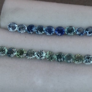 3mm sapphires.  Rock creek Montana sapphires.  Blue, greenish and blue green.  Faceted loose gemstones.  Price is for one sapphire