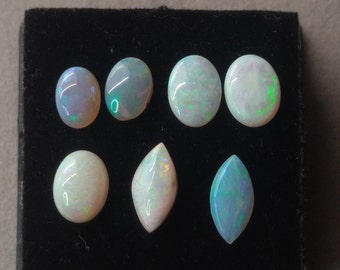 White precious opal cabochon lot. Price is for all cabochons in the pictures.