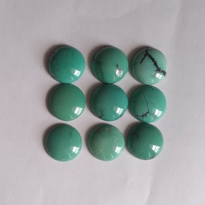 14mm round turquoise cabochon.  Price is for all 8 pieces