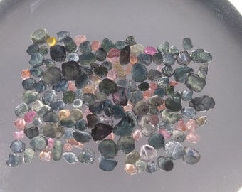 Montana sapphire rough.  Facet grade American sapphire.  LOT of 150 pieces