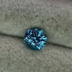 5.5mm Montana sapphire.  Blue rock creek Montana sapphire.  Ethically mined in the USA. Faceted loose sapphire.