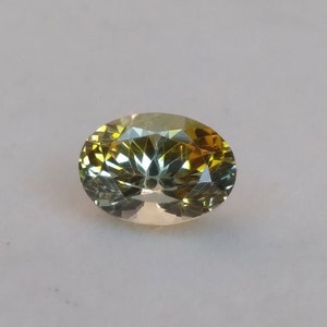 Rock Creek Montana Sapphire. Oval 1.29Ct 7.2x5.2mm Light Yellow Orange Tips. Loose Faceted. Exceptional Quality. Unique Precious Stone