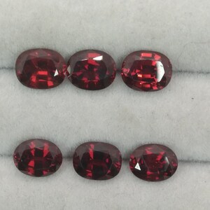 Garnet. Mozambique. Oval Cut. Orangy/Red in Color.  Liquidation Sale. Price is for one Garnet.