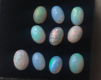 Opal oval cabochons.  Price is for all 10 cabs.