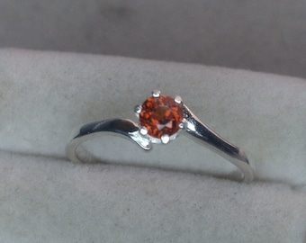Spessartite garnet ring.  Silver ring size 7. 4mm Spessartite garnet