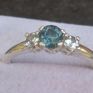 Montana sapphire ring.  Rock Creek Montana sapphires.  Main stone is 4.4mm. Side stones are 3mm.