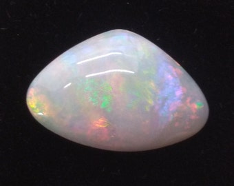 Opal.  White precious Opal.  Very fine piece.