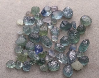 Facet grade Montana sapphire.  Gem rough from rock creek Montana.  LOT of 54 pieces