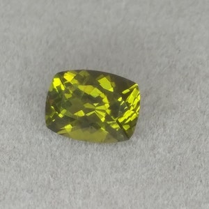 Arizona peridot.  American gemstone.  Faceted loose cushion cut.