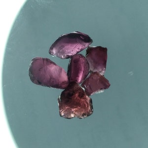 Facet grade rhodolite garnet gem rough.  LOT of 6 pieces.  Very beautiful gemstones