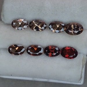 6-6.5x4-4.5mm oval zircon. Nigerian zircon.  Faceted loose gemstone. Price is for one oval zircon