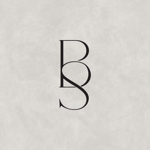 May include: A black and white monogram logo with the letters "B" and "S" intertwined.