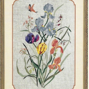 May include: A white ceramic mug with a black handle and the text "But First, Coffee" in a bold, black font. The mug is set against a blurred background, suggesting a cozy setting. The mug appears to be approximately 4 inches tall.