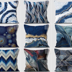 May include: Set of 10 decorative throw pillow covers featuring abstract geometric patterns in shades of blue, gray, and gold. The patterns include swirls, waves, circles, and geometric shapes.