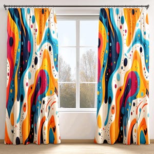 May include: A pair of colorful curtains with a white background and abstract shapes in blue, yellow, red, and black. The curtains have a modern and artistic design.
