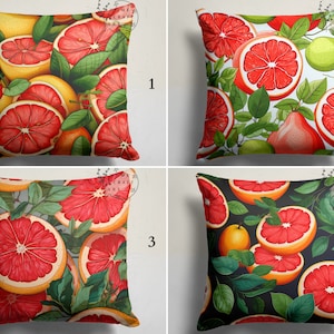 May include: Square throw pillows with vibrant grapefruit designs. The pillows feature bright red grapefruit slices, green leaves, and yellow grapefruit against various backgrounds, including white, yellow, and black. These decorative pillows add a fresh, fruity touch to home decor.