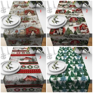 May include: Four Christmas-themed table runners with different designs. One features a winter scene with a snowman and red barn. Another shows sheep and red barns. The third has "Merry Christmas" text and wreaths. The last has a pattern of green and blue pine trees.