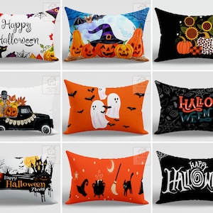 May include: A collection of Halloween-themed decorative throw pillows. Designs include pumpkins, bats, ghosts, and the text "Happy Halloween." Colors include orange, black, and white. Some pillows feature a black truck with pumpkins and a skeleton.