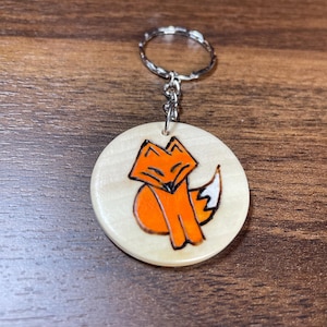 Wood burnt and painted by hand keychain!