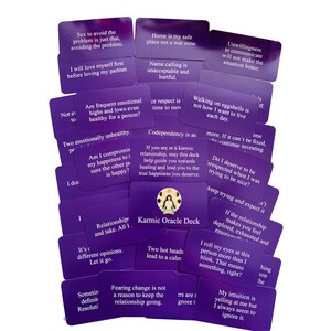 May include: Purple cards with text and illustrations. The cards are part of a Karmic Oracle Deck. The text on the cards includes phrases like "Two emotionally unhealthy" and "Walking on eggshells".