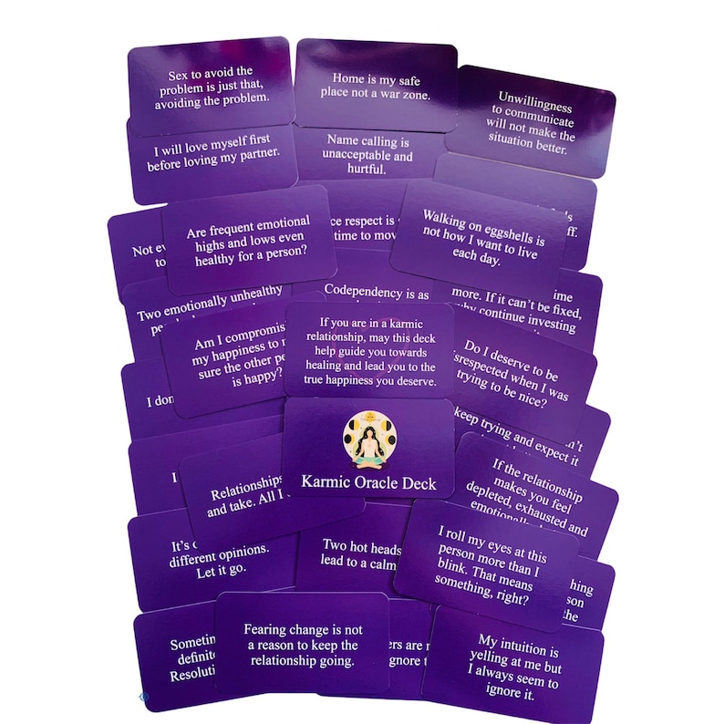 May include: Purple cards with text and illustrations. The cards are part of a Karmic Oracle Deck. The text on the cards includes phrases like "Two emotionally unhealthy" and "Walking on eggshells".