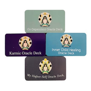 May include: Four different oracle decks with a woman meditating in a circle of moons. The decks are titled "Co-Dependent Oracle Deck", "Inner Child Healing Oracle Deck", "Karmic Oracle Deck", and "My Higher-Self Oracle Deck".