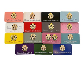 May include: A collection of 12 oracle decks with colorful backgrounds and illustrations of a woman meditating. The decks are labeled with names such as "Self-Love Oracle Deck", "Happy Oracle Deck", "Shadow-Work Oracle Deck", "Triggers Oracle Deck", "My Higher-Self Oracle Deck", "Twin Flame Oracle Deck", "Co-Dependent Oracle Deck", "Soul-Mate Oracle Deck", "Inner Child Healing Oracle Deck", "Karmic Oracle Deck", "Manifest Oracle Deck", and "Healed Parent Oracle Deck".