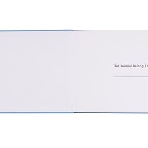 May include: A blank blue journal with the text "This Journal Belong To:" printed on the right page.