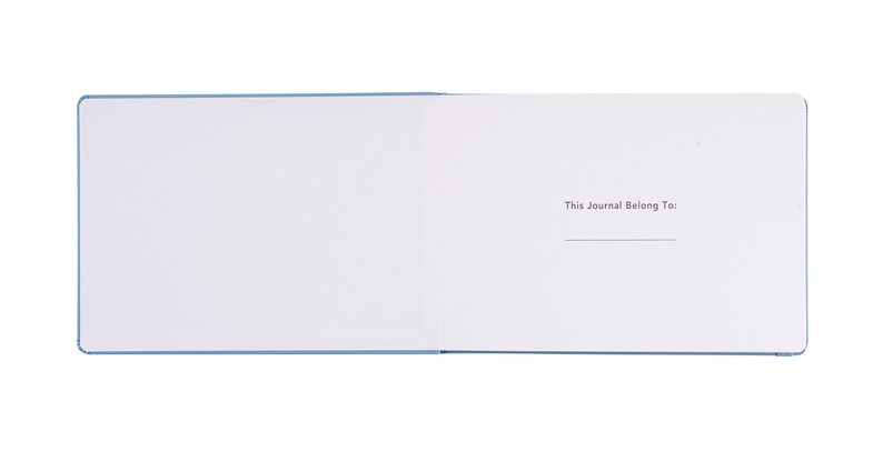 May include: A blank blue journal with the text "This Journal Belong To:" printed on the right page.