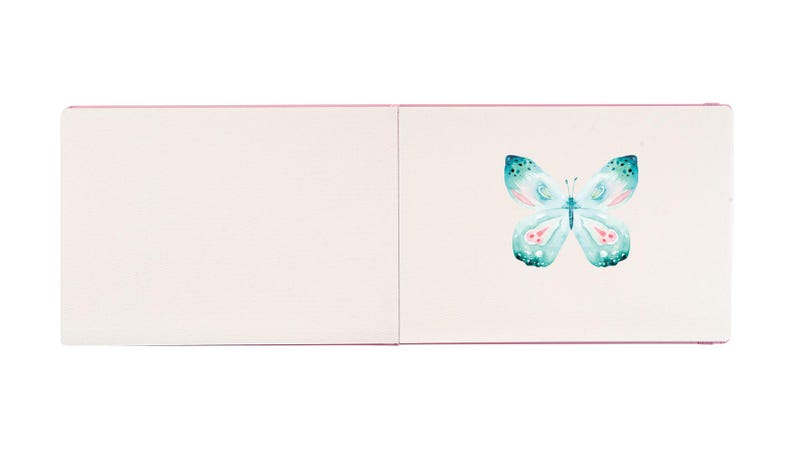 May include: A blank white card with a pink border. The card is open to reveal a watercolour illustration of a light blue butterfly with pink accents.