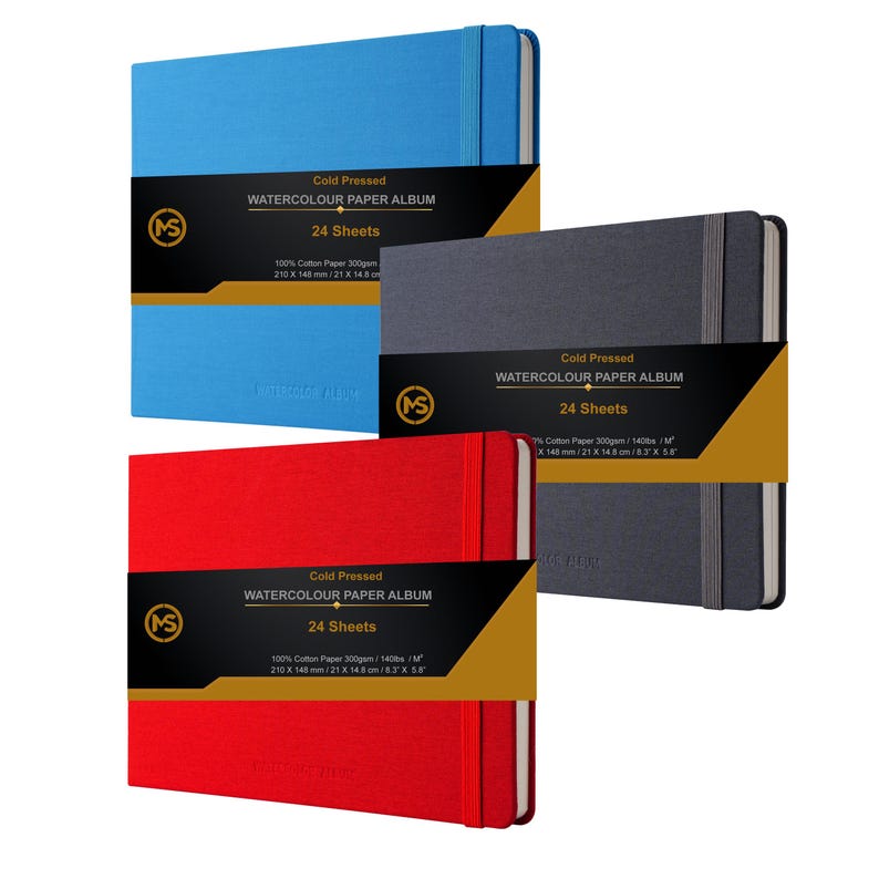 May include: Three watercolour paper albums in blue, grey, and red. Each album has a black label with gold lettering that reads "Cold Pressed Watercolour Paper Album 24 Sheets 100% Cotton Paper 300gsm/140lb/m&sup2; 210 x 148 mm/21 x 14.8 cm/8.3 x 5.8"