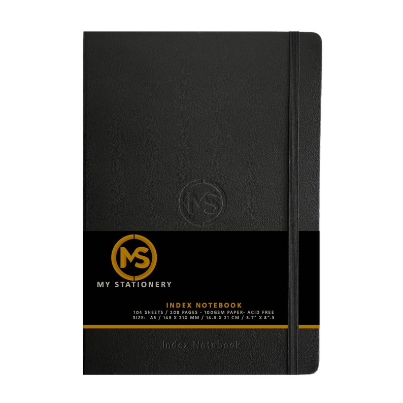 May include: Black index notebook with a gold and black band across the middle. The notebook has a black elastic band closure. The text "MY STATIONERY" and "INDEX NOTEBOOK" are printed on the cover. The notebook is 5.7" x 8.3".