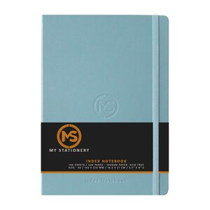 May include: A light blue A5 index notebook with a matching elastic band closure. The notebook features the text "MY STATIONERY" and "INDEX NOTEBOOK" on the cover. The notebook measures 5.7" x 8.3".