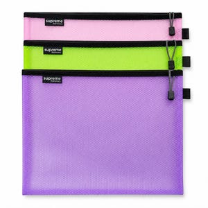 May include: Three rectangular mesh zip pouches in pink, neon green, and purple. Each pouch features a black zip closure, a black side tab, and a black label with the white text Supreme Stationery. A grey cord pull is attached to each zip.