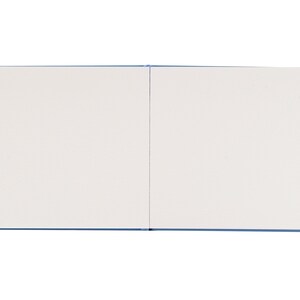 May include: A blank, white sketchbook with a blue cover. The sketchbook is closed and lying flat.