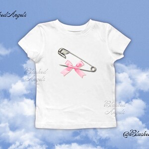 Safety Pin Pink Ribbon Bow Coquette Baby Tee | Y2k Graphic Baby Tee, 90s Baby Tee, Trending Baby Tee, Cool Girl Baby Tee, It Girl Baby Tee