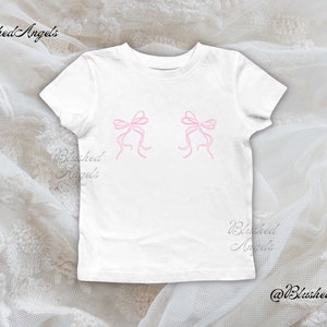 Double Pink Ribbon Bow Coquette Baby Tee | Y2k Graphic Baby Tee, 90s Baby Tee, Trending Baby Tee, Cool Girl Baby Tee, It Girl Baby Tee