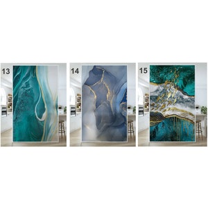 May include: Three abstract art prints with a blue, green, and gold color scheme. The prints feature swirling patterns and gold accents.
