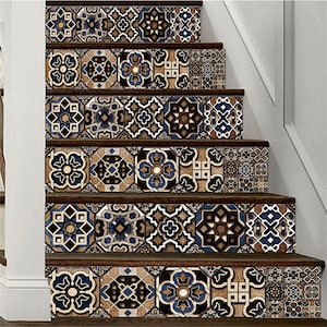 May include: A set of five decorative stair treads with a Moroccan tile pattern in shades of brown, blue, and white. The treads are made of a durable material and are easy to apply.