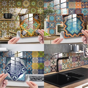 May include: A set of colourful patterned tile stickers for kitchen backsplashes. The stickers feature a variety of geometric and floral designs in shades of blue, green, yellow, and red. The stickers are shown applied to a kitchen backsplash, a hob, and a sink.